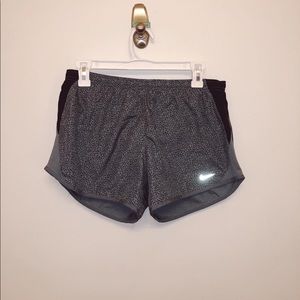 Grey patterned nike athletic shorts